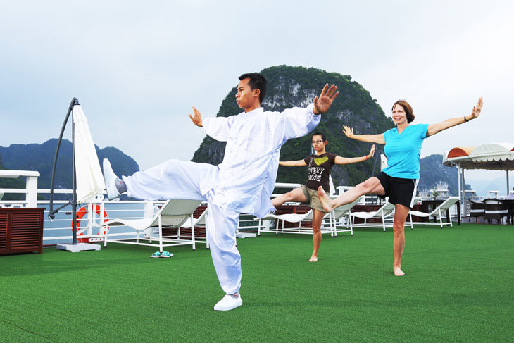 Welcome a new day on the bay with tai chi exercise on the sundeck