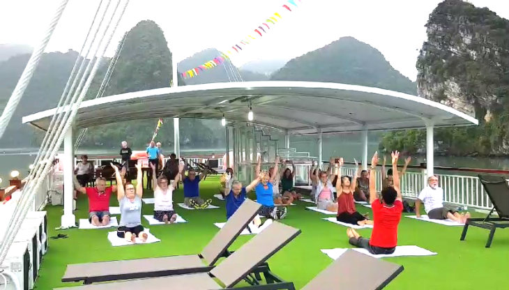 Practice Tai chi on Sundeck - Calypso Cruises